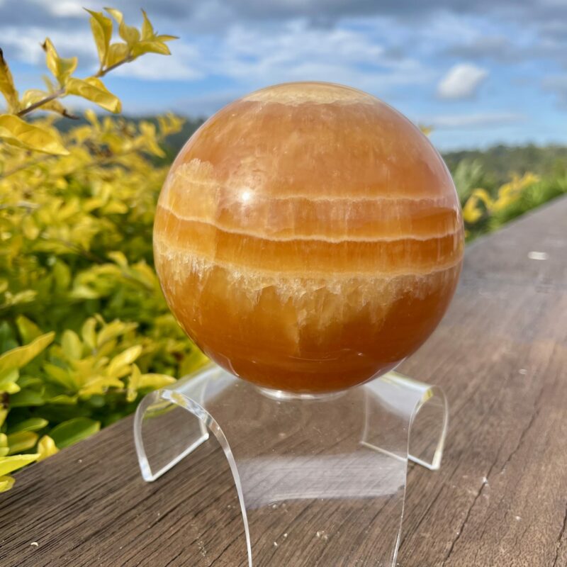 This is XL Orange Calcite World Within World Sphere 2.1kg