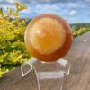 This is XL Orange Calcite World Within World Sphere 2.1kg