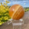 This is XL Orange Calcite World Within World Sphere 2.1kg