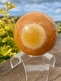 This is XL Orange Calcite World Within World Sphere 2.1kg