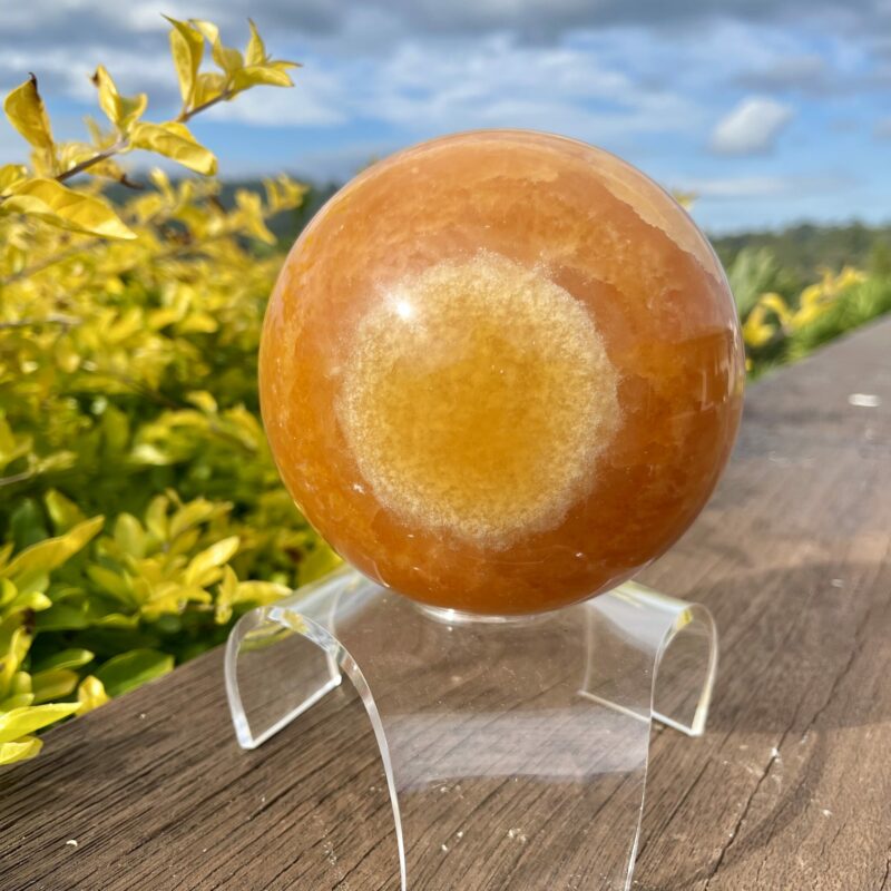 This is XL Orange Calcite World Within World Sphere 2.1kg