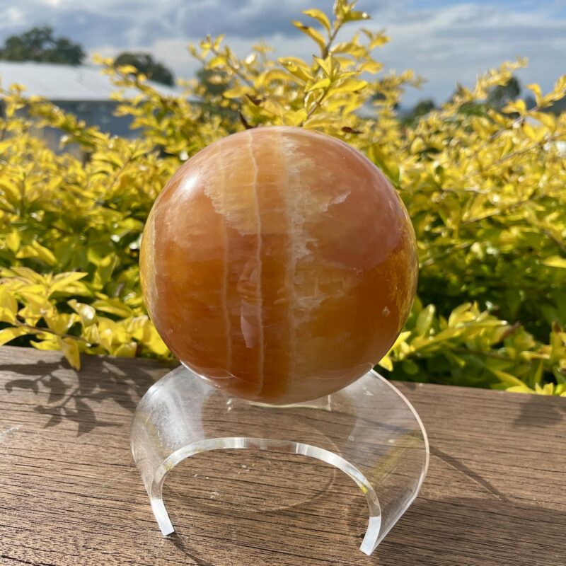 This is XL Orange Calcite World Within World Sphere 2.1kg