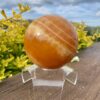 This is XL Orange Calcite World Within World Sphere 2.1kg