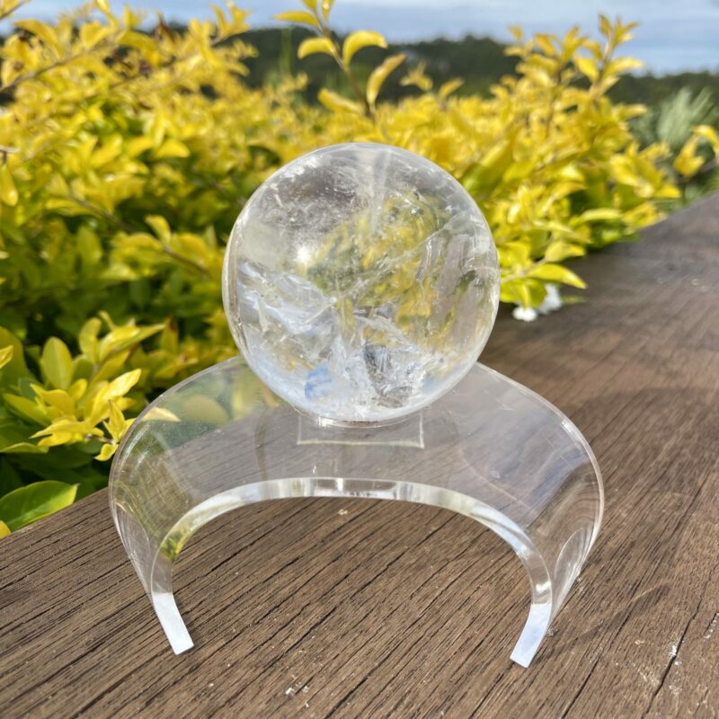 This is Clear Quartz Sphere with Earth Inclusions 72mm