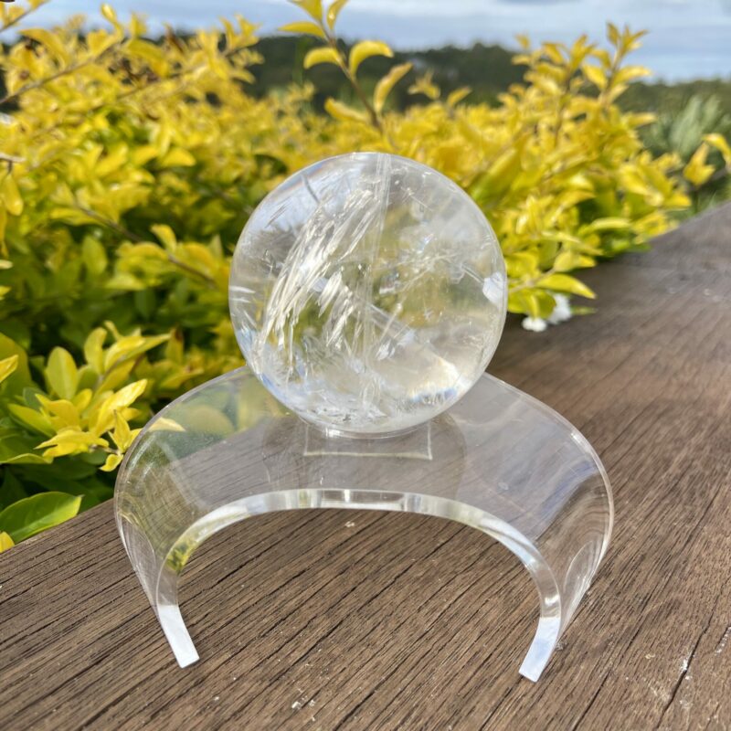 This is Clear Quartz Sphere with Earth Inclusions 72mm