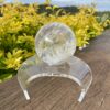 This is Clear Quartz Sphere with Earth Inclusions 72mm