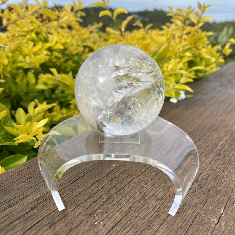 This is Clear Quartz Sphere with Earth Inclusions 72mm