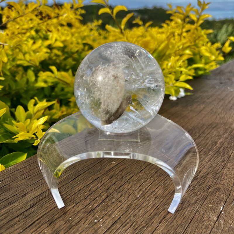 This is Clear Quartz Sphere with Earth Inclusions 72mm