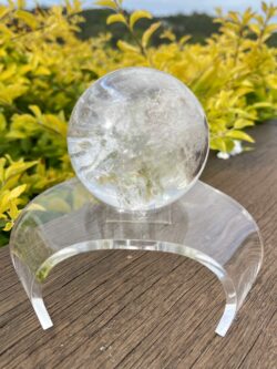 This is Clear Quartz Sphere with Earth Inclusions 72mm