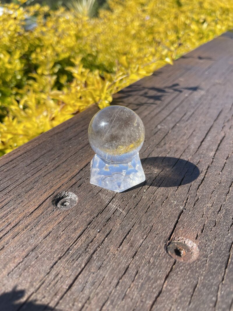 This is Highway to Heaven Rutilated Clear Quartz Sphere 4cm