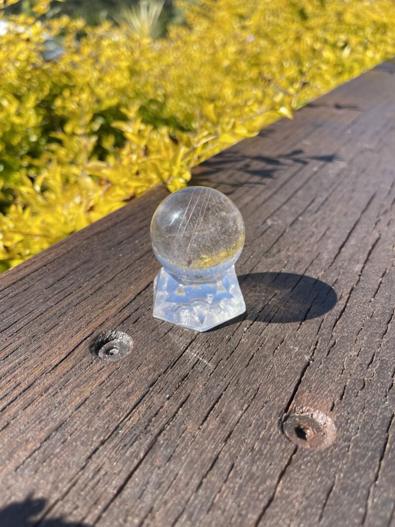 This is Highway to Heaven Rutilated Clear Quartz Sphere 4cm