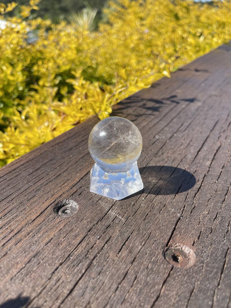 This is Highway to Heaven Rutilated Clear Quartz Sphere 4cm