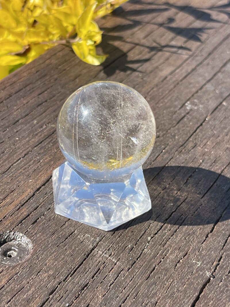 This is Highway to Heaven Rutilated Clear Quartz Sphere 4cm