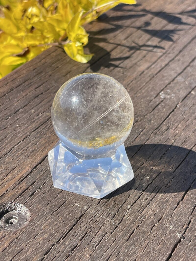 This is Highway to Heaven Rutilated Clear Quartz Sphere 4cm