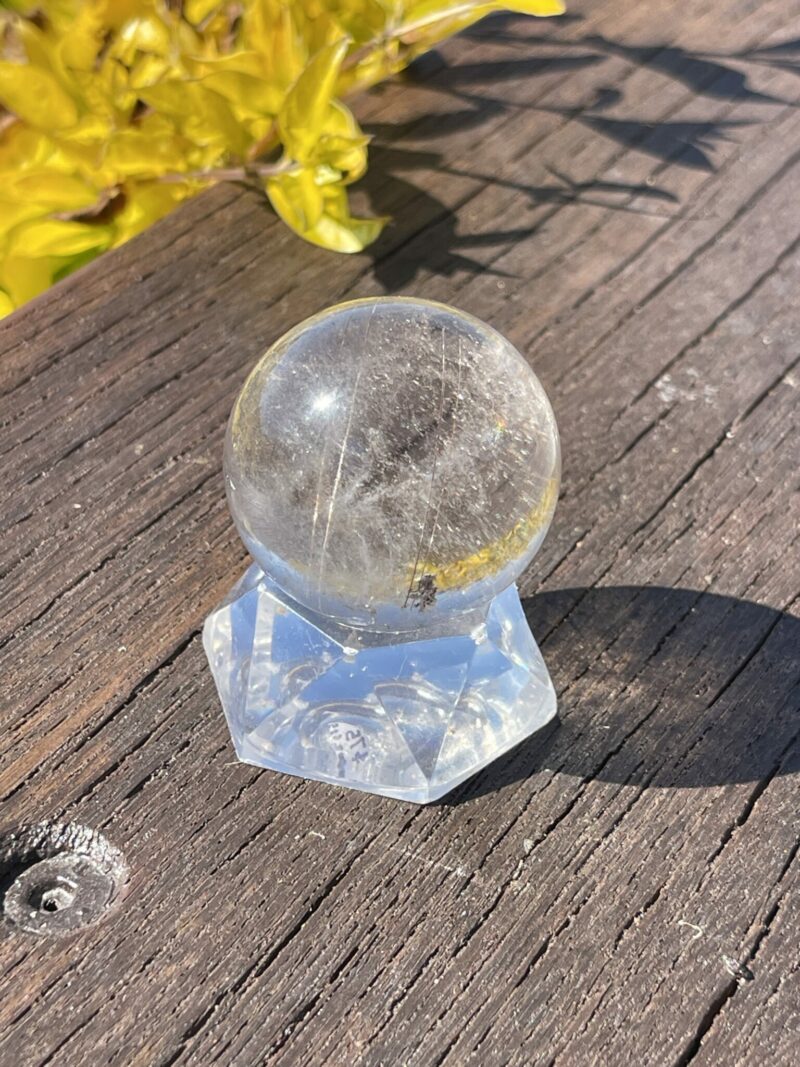 This is Highway to Heaven Rutilated Clear Quartz Sphere 4cm