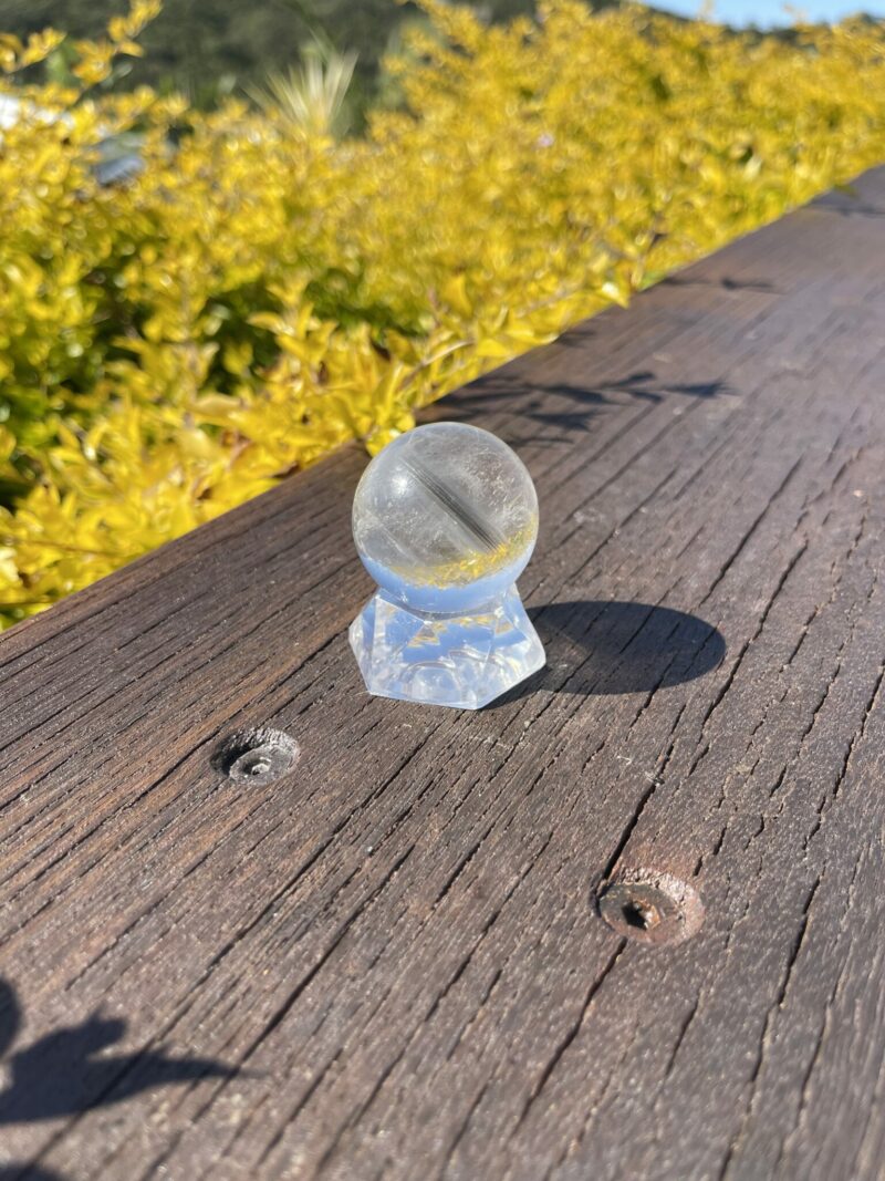 This is Grey Phantom Clear Quartz Sphere 4cm