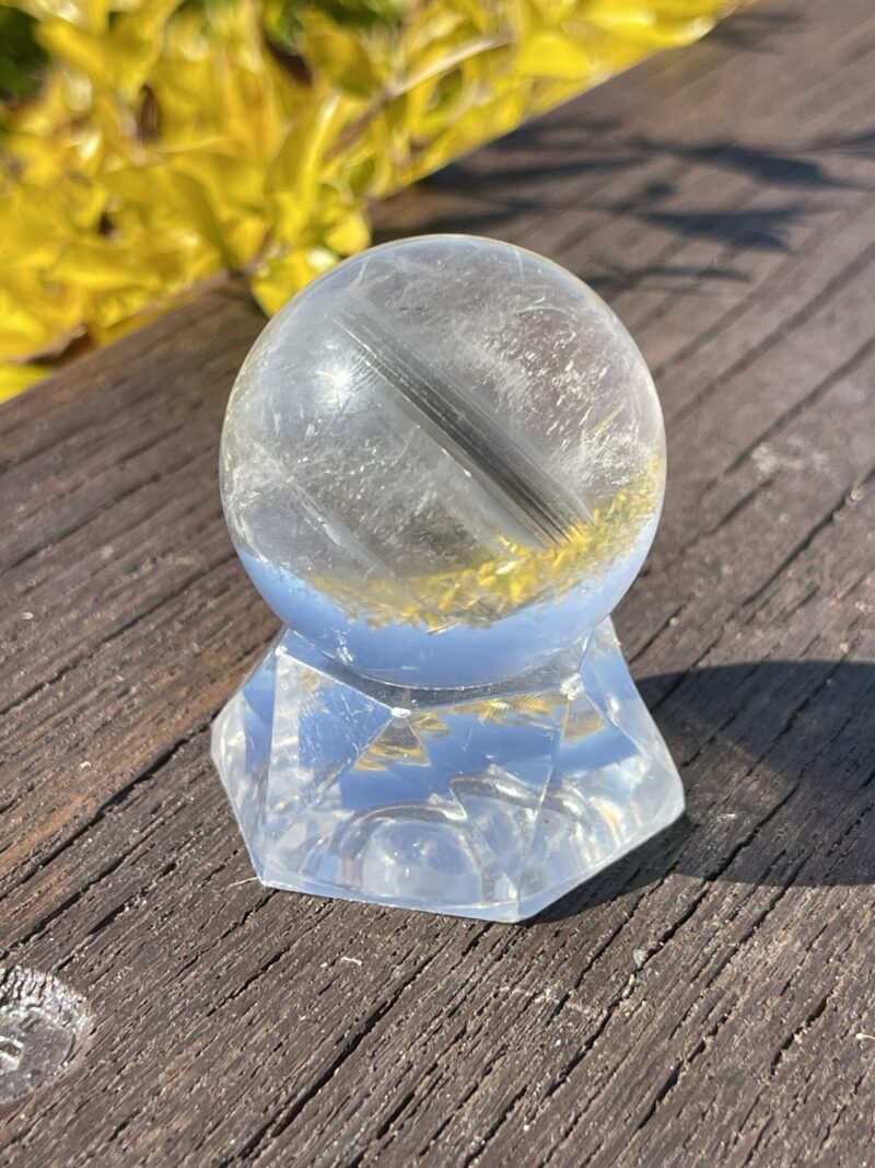 This is Grey Phantom Clear Quartz Sphere 4cm