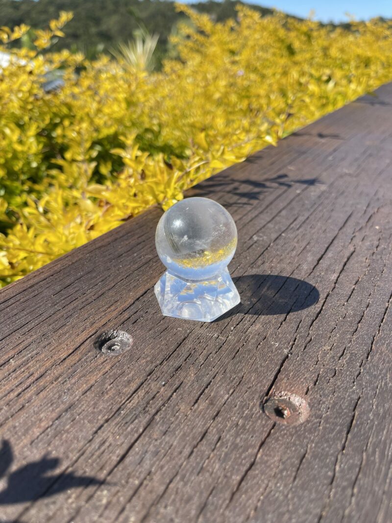 This is Grey Phantom Clear Quartz Sphere 4cm