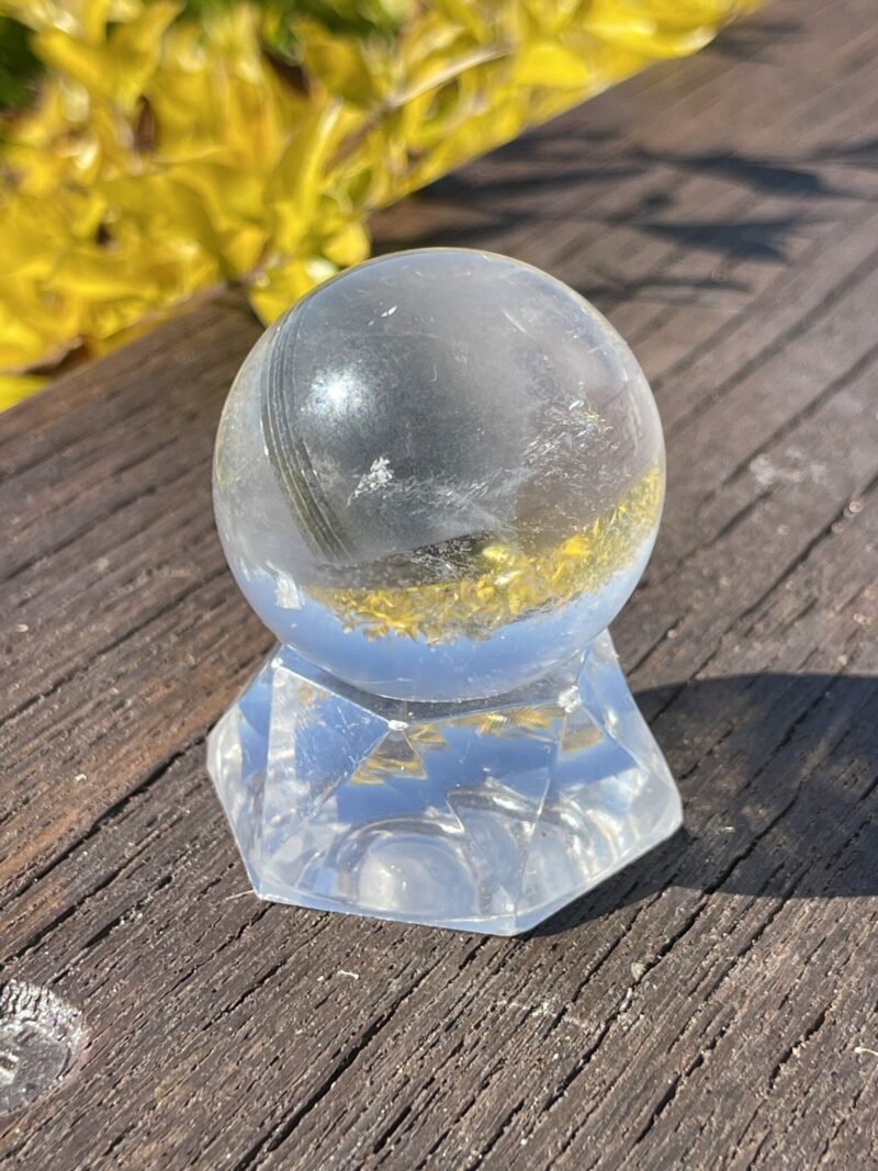 This is Grey Phantom Clear Quartz Sphere 4cm