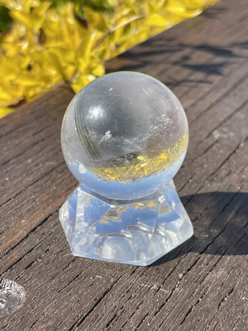 This is Grey Phantom Clear Quartz Sphere 4cm