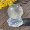 This is Grey Phantom Clear Quartz Sphere 4cm