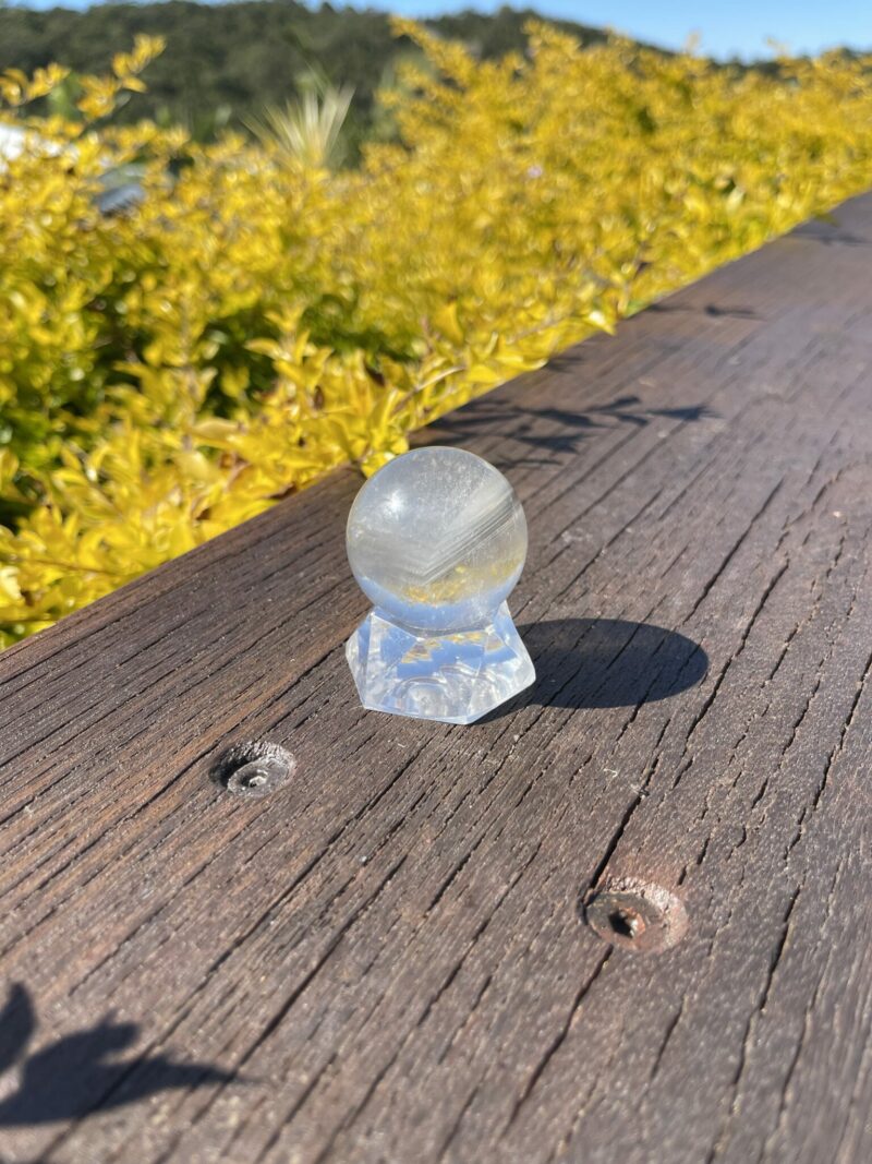 This is Grey Phantom Clear Quartz Sphere 4cm