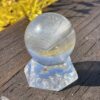 This is Grey Phantom Clear Quartz Sphere 4cm