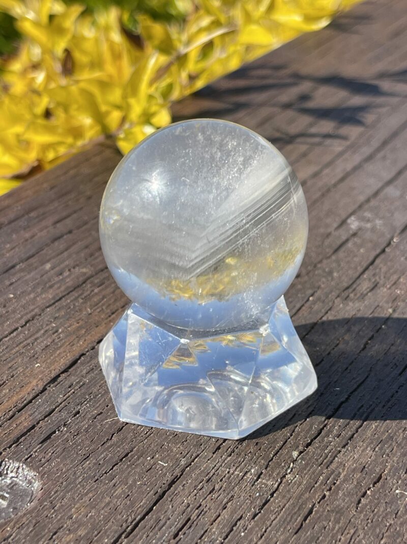 This is Grey Phantom Clear Quartz Sphere 4cm