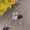 This is Rainbow-Filled Light Smoky Quartz Sphere 4cm