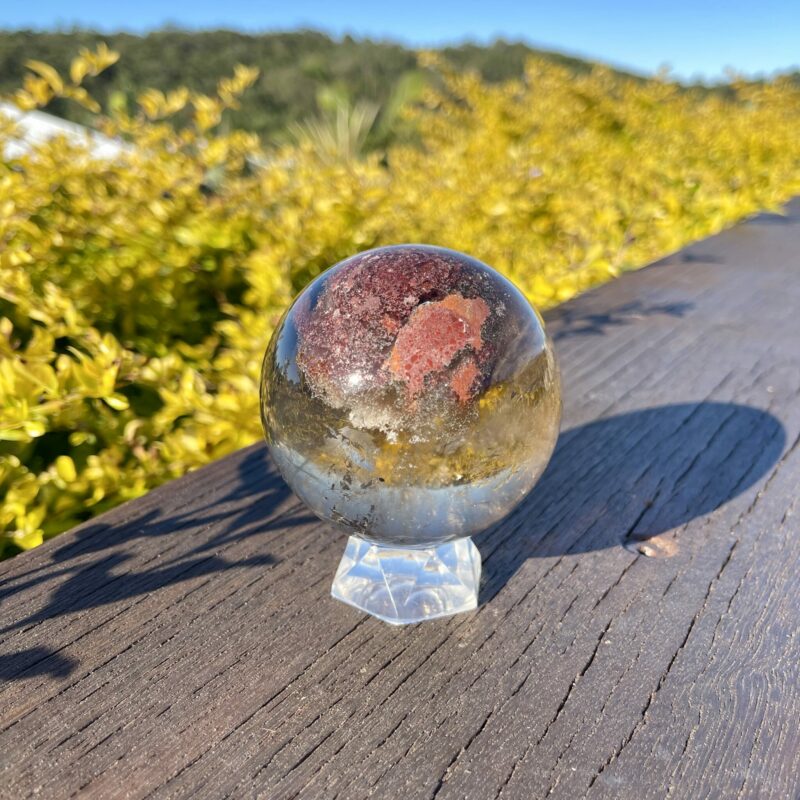 This is Stunning Large Smoky Quartz Sphere with Mother Earth Inclusion