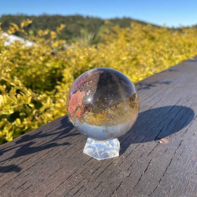 This is Stunning Large Smoky Quartz Sphere with Mother Earth Inclusion