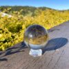 This is Stunning Large Smoky Quartz Sphere with Mother Earth Inclusion