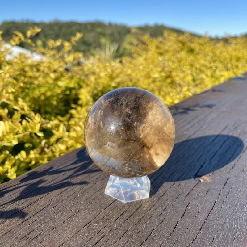 This is Stunning Large Smoky Quartz Sphere with Mother Earth Inclusion