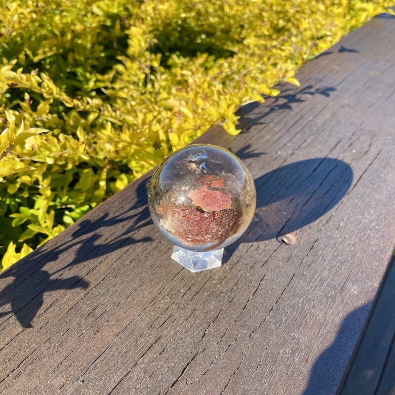 This is Stunning Large Smoky Quartz Sphere with Mother Earth Inclusion