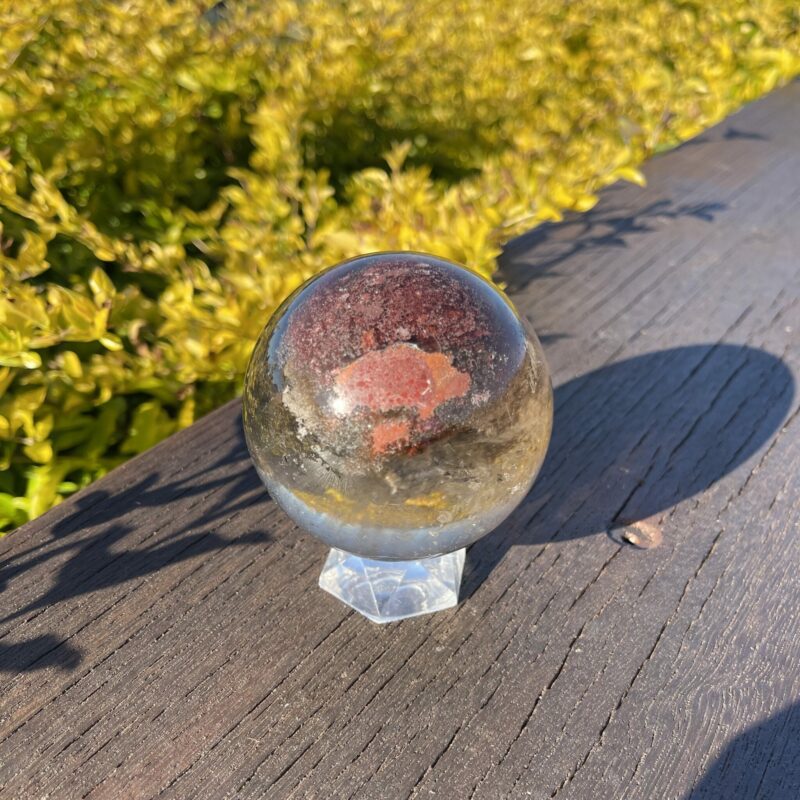 This is Stunning Large Smoky Quartz Sphere with Mother Earth Inclusion