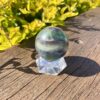 This is Rainbow Fluorite Magical Medium Sphere 44mm