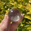 This is Diamonds in the Sky Smoky Small Sphere 28mm