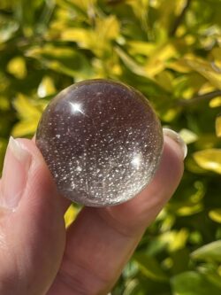 This is Diamonds in the Sky Smoky Small Sphere 28mm