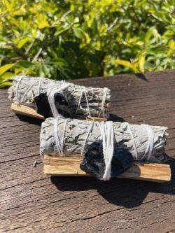 This is 2-Pack Smudge Combo: White Sage, Palo Santo Stick, and Raw Black Obsidian for Cleansing and Protection