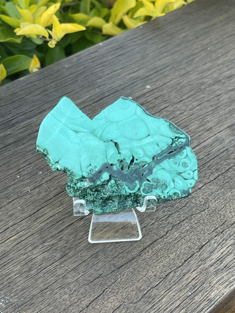 This is Discover the Magic of Our Malachite Slice - 129g