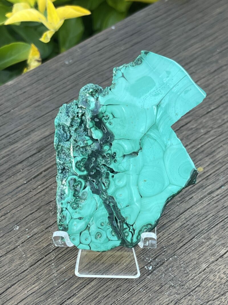 This is Discover the Magic of Our Malachite Slice - 129g