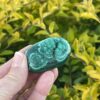 This is Radiant Malachite Palm Stone - 74gr