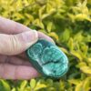 This is Radiant Malachite Palm Stone - 74gr