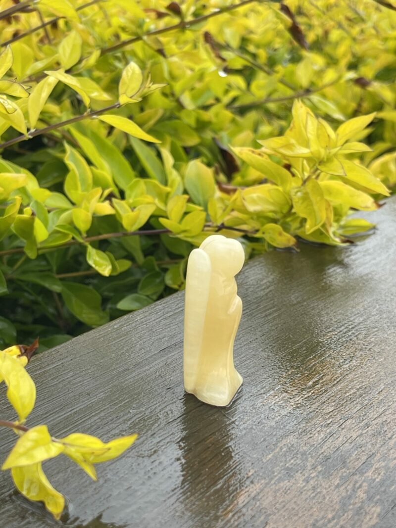 This is Radiant Yellow Calcite Angel of Joy - 5cm