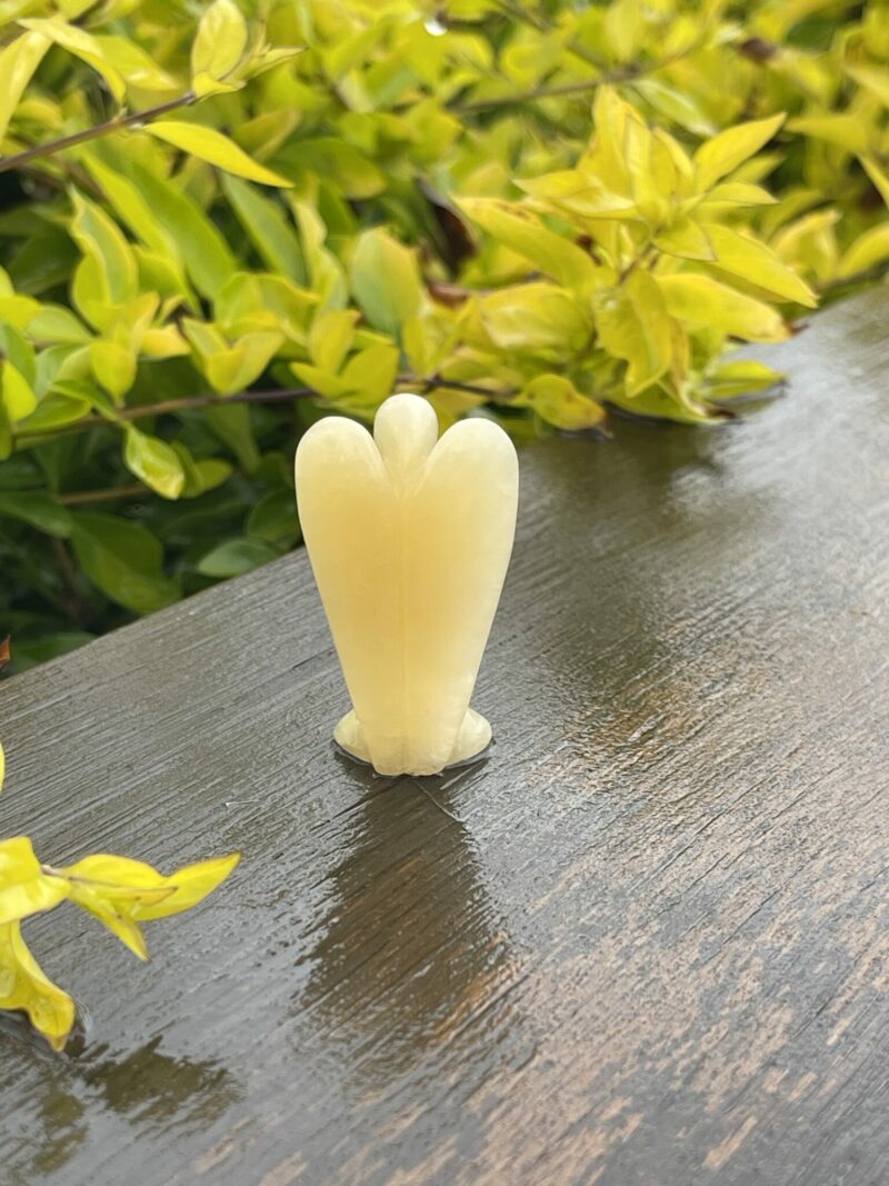 This is Radiant Yellow Calcite Angel of Joy - 5cm