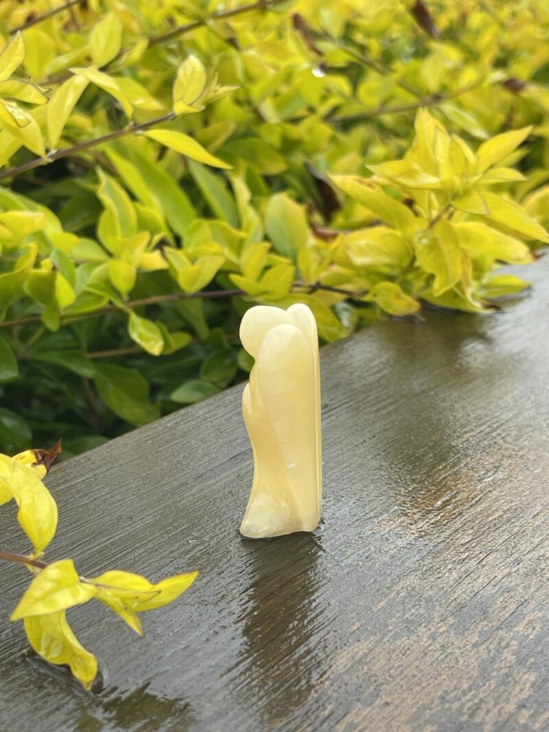 This is Radiant Yellow Calcite Angel of Joy - 5cm