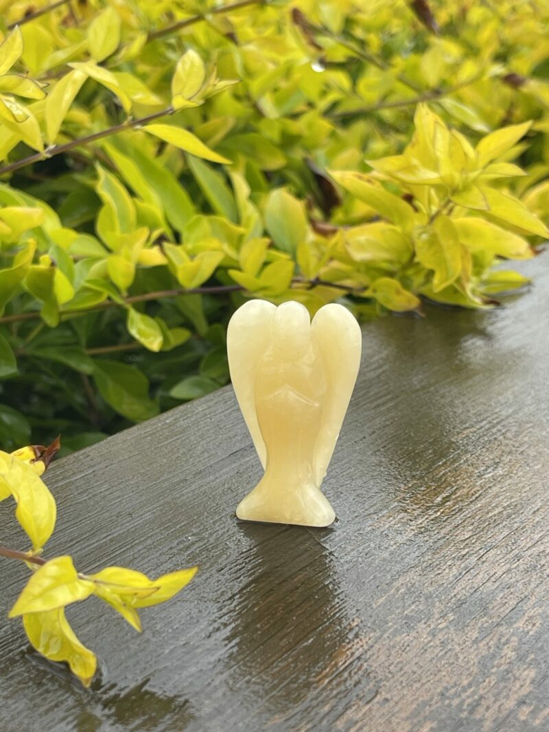 This is Radiant Yellow Calcite Angel of Joy - 5cm