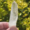 This is Clear Cute Lemurian Quartz Point – 53g