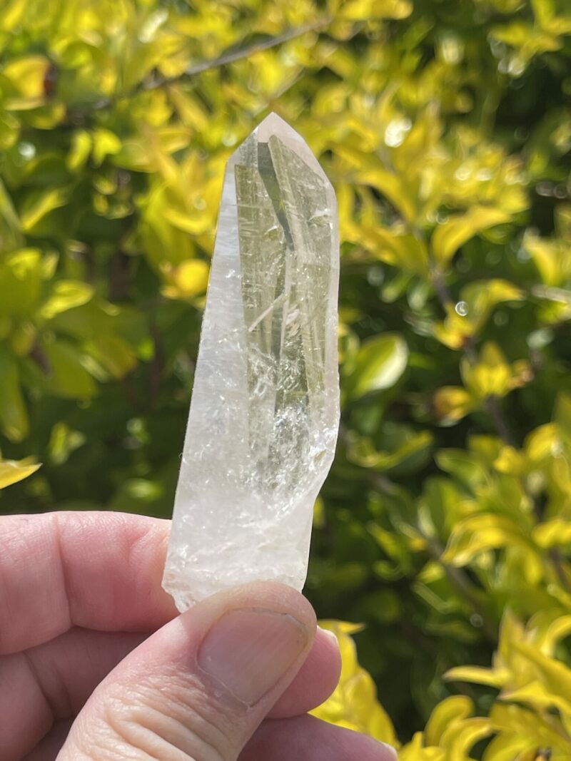 This is Clear Cute Lemurian Quartz Point – 53g