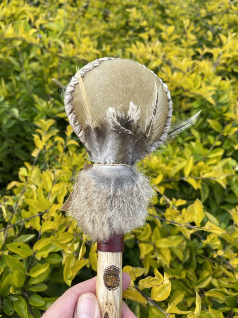 This is Ceremonial Goat Hide Rattle with Peacock Ore (30cm)